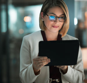 woman looking at accounting firms on a tablet